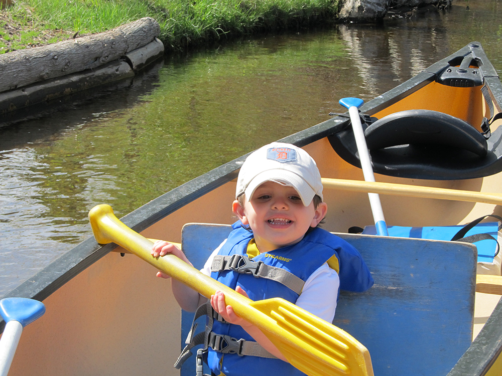 Small Boy Canoeing
